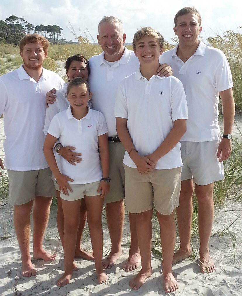 The Kiefer family relaxing as a group at the beach