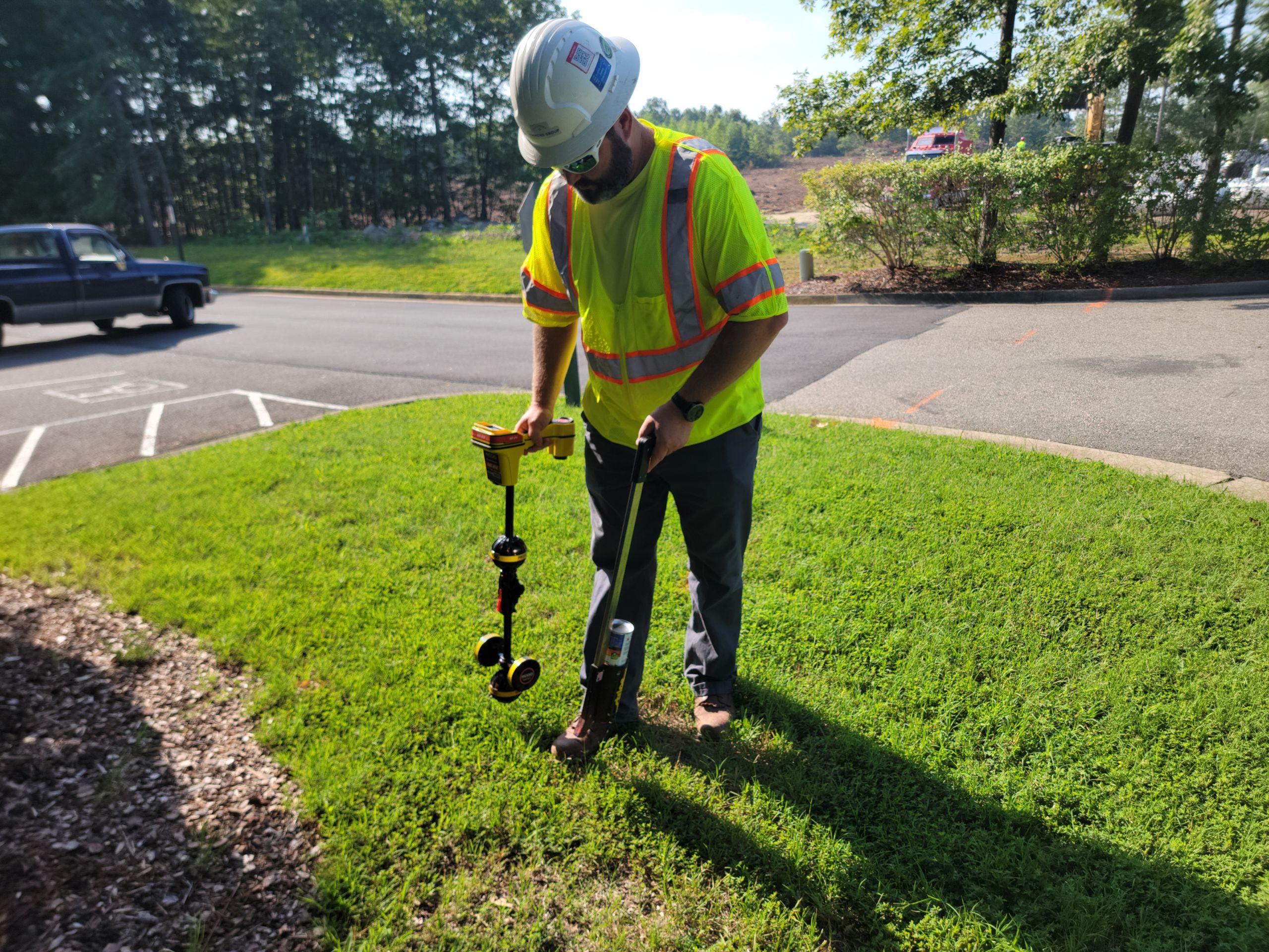 A Timmons Group SUE professional uses a Ridgid SeekTech SR-20 Locator to find utilities.