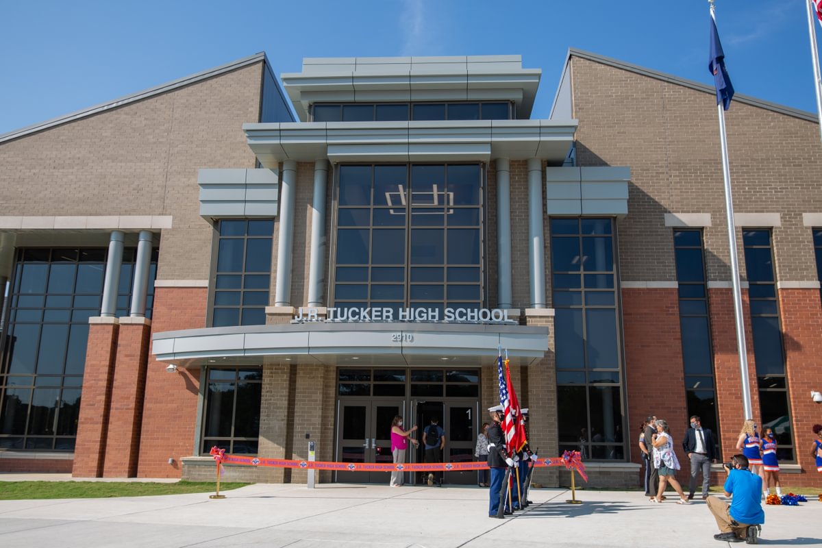 Ground photo featuring the front of J.R. Tucker High School during the ribbon cutting ceremony.